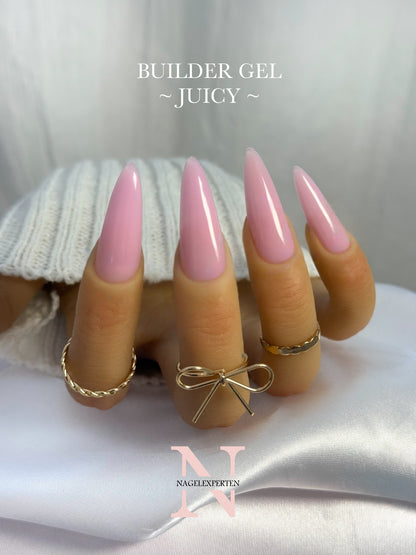 Hand som visar rosa builder gel i färgen Juicy.