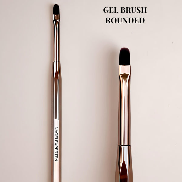 Pensel med rundad borste för applicering av builder gel för naglar.